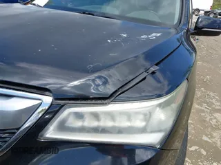 2016 Acura MDX with VIN 5FRYD3H2XGB014559, listed as a IAAI auction lot 41996171 with 154,860 mi miles. Bid and sale history available at carsss.com. Image 18.