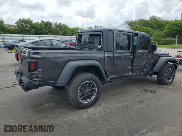 2023 Jeep Gladiator Sport с VIN 1C6HJTAG6PL584627, выставлен на аукционе Copart как лот 65161815 с пробегом 7 020 миль миль и Чистый • Clean title. История ставок и продаж доступна на DreamBid. Изображение 3.