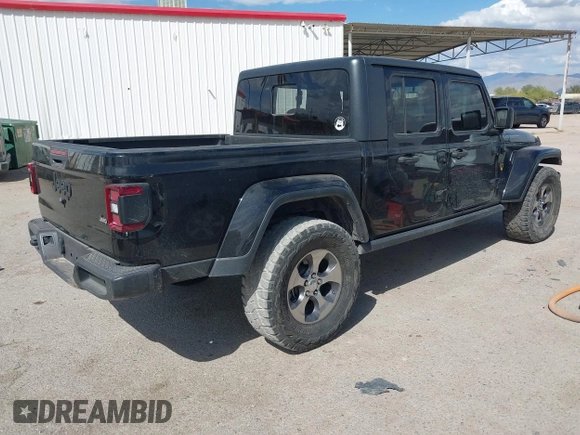 2021 Jeep Gladiator Willys with VIN 1C6HJTAG7ML523718, listed as a IAAI auction lot 42206058 with 48,071 mi miles and . Bid and sale history available at DreamBid. Image 4.