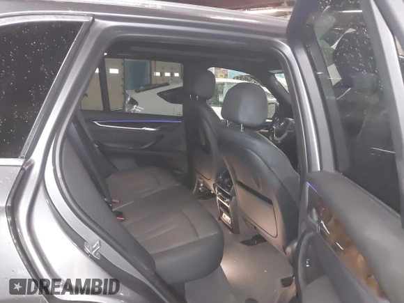 2018 BMW X5 xDrive35i with VIN 5UXKR0C53J0Y03214, listed as a IAAI auction lot 41509082 with 92,552 mi miles. Bid and sale history available at carsss.com. Image 8.