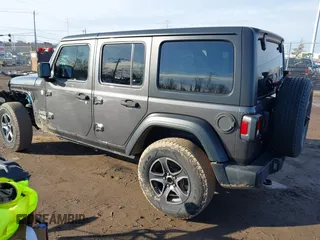 2018 Jeep Wrangler Unlimited Sport S with VIN 1C4HJXDN0JW255003, listed as a IAAI auction lot 41528394 with 55,660 mi miles and . Bid and sale history available at DreamBid. Image 3.