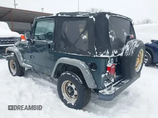 2004 Jeep Wrangler SE with VIN 1J4FA29154P778915, listed as a IAAI auction lot 41245325 with 205,852 mi miles and . Bid and sale history available at DreamBid. Image 3.