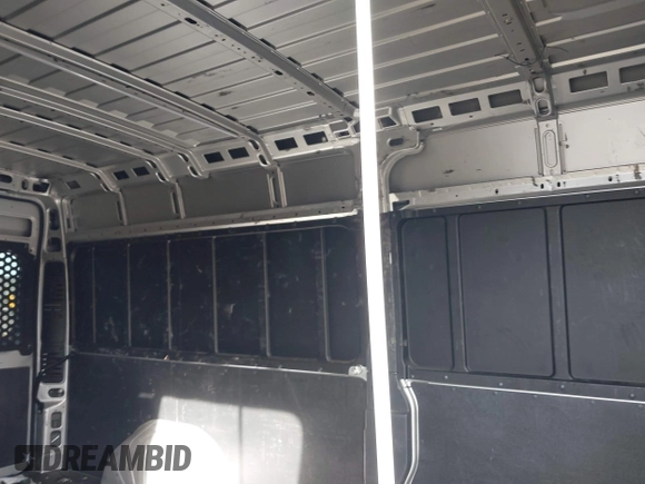 2023 Ram ProMaster Cargo with VIN 3C6MRVJG5PE501250, listed as a IAAI auction lot 40670587 with 97,369 mi miles and . Bid and sale history available at DreamBid. Image 8.