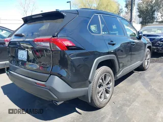 2024 Toyota RAV4 Hybrid XLE Premium with VIN JTMB6RFV0RD126685, listed as a IAAI auction lot 41870692 with 21,637 mi miles. Bid and sale history available at carsss.com. Image 4.