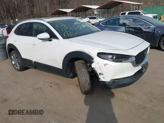 2022 Mazda CX-30 S Premium with VIN 3MVDMBDL7NM412263, listed as a IAAI auction lot 41779877 with 42,088 mi miles and . Bid and sale history available at carsss.com. Image 1.
