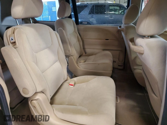 2009 Honda Odyssey LX with VIN 5FNRL38259B018546, listed as a Copart auction lot 62142015 with 162,459 mi miles and Salvage title. Bid and sale history available at DreamBid. Image 11.