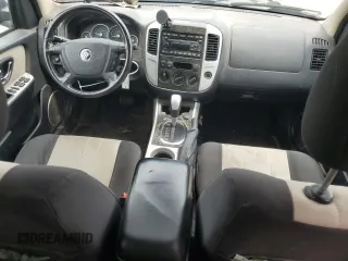 2007 Mercury Mariner Luxury with VIN 4M2YU91137KJ11539, listed as a Copart auction lot 64846175 with 139,488 mi miles and Salvage title. Bid and sale history available at DreamBid. Image 8.