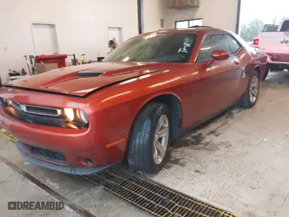 2020 Dodge Challenger SXT with VIN 2C3CDZAG6LH181644, listed as a IAAI auction lot 41857479 with 84,397 mi miles. Bid and sale history available at carsss.com. Image 2.
