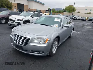 2014 Chrysler 300 with VIN 2C3CCAAG7EH249196, listed as a IAAI auction lot 42180023 with 48,241 mi miles and . Bid and sale history available at DreamBid. Image 23.