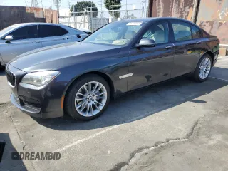 2015 BMW 7 Series 740i with VIN WBAYA6C56FG273287, listed as a Copart auction lot 75036014 with 143,527 mi miles and Salvage Title. Bid and sale history available at carsss.com. Image 1.