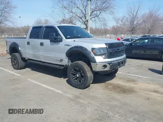 2014 Ford F-150 with VIN 1FTVW1EFXEKD65059, listed as a IAAI auction lot 41791605 with 146,190 mi miles and . Bid and sale history available at DreamBid. Image 1.