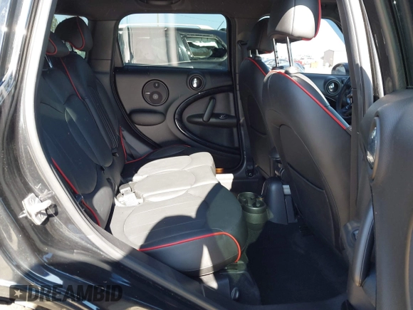 2015 MINI Countryman S with VIN WMWZC3C5XFWT04916, listed as a IAAI auction lot 41636369 with 101,448 mi miles and . Bid and sale history available at DreamBid. Image 8.