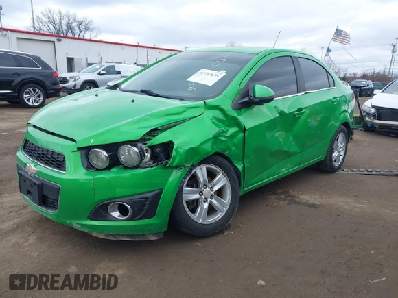 2015 Chevrolet Sonic LT with VIN 1G1JC5SH7F4104412, listed as a IAAI auction lot 41737655 with 124,304 mi miles and . Bid and sale history available at DreamBid. Image 2.