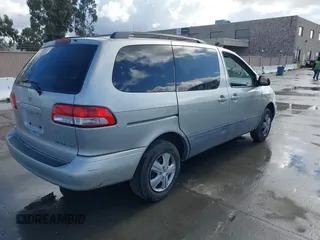 2002 Toyota Sienna CE with VIN 4T3ZF19C72U478049, listed as a IAAI auction lot 41677760 with 234,022 mi miles. Bid and sale history available at carsss.com. Image 4.