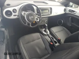 2014 Volkswagen Beetle 1.8T z VIN 3VWJ17AT1EM663680, wystawiony jako Copart lot #48163255 z przebiegiem 67 809 mil mil oraz Szkoda całkowita • Salvage title. Historia ofert i sprzedaży dostępna na DreamBid. Obrazek 8.