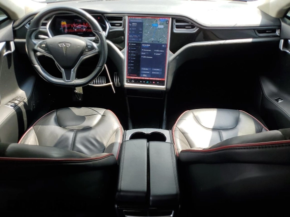 2014 Tesla Model S 60 with VIN 5YJSA1H11EFP36611, listed as a Copart auction lot 59544085 with 97,214 mi miles and Salvage title. Bid and sale history available at DreamBid. Image 8.