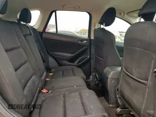 2016 Mazda CX-5 Touring z VIN JM3KE2CY7G0654292, wystawiony jako Copart lot #53433745 z przebiegiem 168 273 mil mil oraz Szkoda całkowita • Salvage title. Historia ofert i sprzedaży dostępna na DreamBid. Obrazek 11.