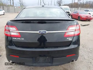 2016 Ford Taurus SEL z VIN 1FAHP2H80GG130887, wystawiony jako IAAI lot #41911575 z przebiegiem 138 469 mil mil oraz . Historia ofert i sprzedaży dostępna na DreamBid. Obrazek 16.