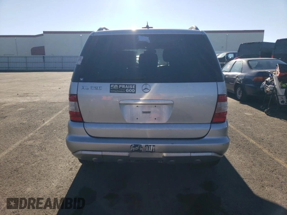 2002 Mercedes-Benz M-Class with VIN 4JGAB54E62A297849, listed as a Copart auction lot 83912114 with 240,479 mi miles and Salvage Title. Bid and sale history available at carsss.com. Image 6.