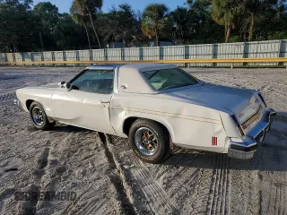 1975 Oldsmobile Cutlass z VIN 3J57T5M323248, wystawiony jako Copart lot #80526124 z przebiegiem 13 934 mil mil oraz Szkody całkowita. Historia ofert i sprzedaży dostępna na DreamBid. Obrazek 2.