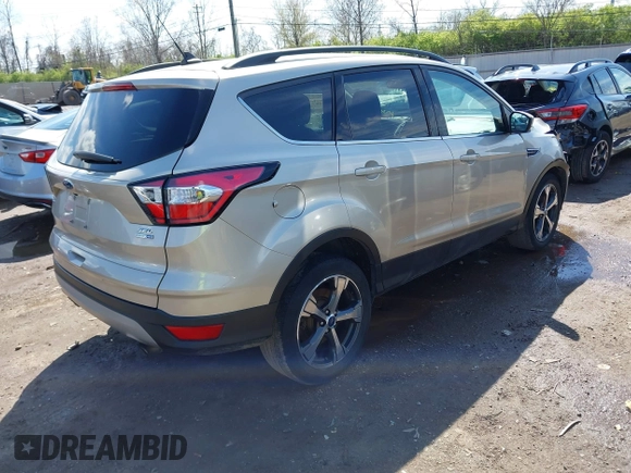 2018 Ford Escape SEL with VIN 1FMCU9HD1JUD49543, listed as a IAAI auction lot 42003218 with 122,768 mi miles. Bid and sale history available at carsss.com. Image 4.