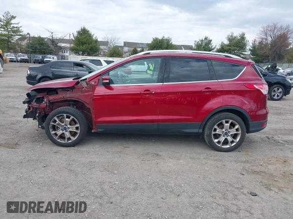 2016 Ford Escape Titanium with VIN 1FMCU9JX2GUA89716, listed as a IAAI auction lot 41899786 with 85,474 mi miles and . Bid and sale history available at DreamBid. Image 14.