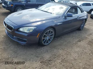2012 BMW 6 Series 650i z VIN WBALZ3C57CDL71551, wystawiony jako Copart lot #54622705 z przebiegiem Nie podano mil oraz Szkody całkowita. Historia ofert i sprzedaży dostępna na DreamBid. Obrazek 1.