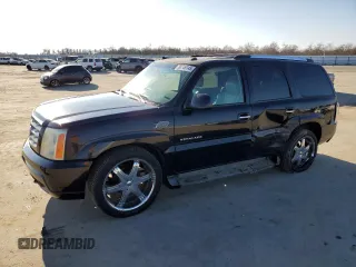 2003 Cadillac Escalade z VIN 1GYEC63T43R157689, wystawiony jako Copart lot #88749145 z przebiegiem 138 905 mil mil oraz Szkoda całkowita • Salvage title. Historia ofert i sprzedaży dostępna na DreamBid. Obrazek 1.