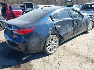 2017 Mazda Mazda6 Touring with VIN JM1GL1V57H1129309, listed as a IAAI auction lot 41654988 with 117,705 mi miles. Bid and sale history available at carsss.com. Image 4.