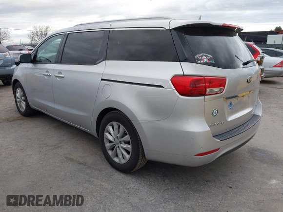 2016 Kia Sedona EX with VIN KNDMC5C13G6100420, listed as a IAAI auction lot 41785604 with 142,677 mi miles. Bid and sale history available at carsss.com. Image 3.