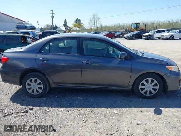 2011 Toyota Corolla L with VIN JTDBU4EE4B9144190, listed as a IAAI auction lot 42060728 with 115,299 mi miles. Bid and sale history available at carsss.com. Image 13.