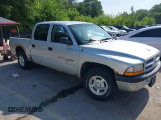 2001 Dodge Dakota Sport with VIN 1B7GL2AX11S118075, listed as a IAAI auction lot 42705551 with 363,644 mi miles and . Bid and sale history available at DreamBid. Image 1.