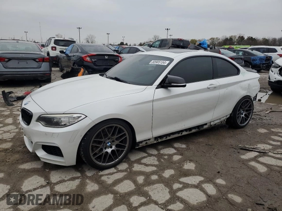 2015 BMW 2 Series M235i with VIN WBA1J7C59FV358868, listed as a Copart auction lot 80905154 with 88,561 mi miles and Salvage Title. Bid and sale history available at carsss.com. Image 1.