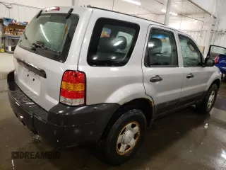 2007 Ford Escape XLS with VIN 1FMCU92Z77KA84801, listed as a Copart auction lot 82052144 with 180,774 mi miles and Salvage title. Bid and sale history available at DreamBid. Image 3.