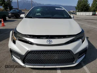2021 Toyota Corolla SE with VIN 5YFP4MCE5MP082675, listed as a Copart auction lot 50195825 with 74,683 mi miles and Salvage Title. Bid and sale history available at carsss.com. Image 5.