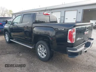 2019 GMC Canyon 4WD SLE z VIN 1GTG6CEN2K1354585, wystawiony jako IAAI lot #42014158 z przebiegiem 34 269 mil mil oraz . Historia ofert i sprzedaży dostępna na DreamBid. Obrazek 3.