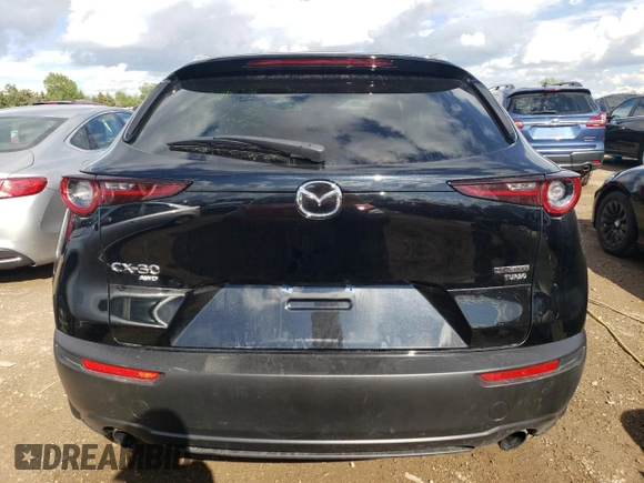 2022 Mazda CX-30 2.5 Turbo with VIN 3MVDMBAY0NM447128, listed as a Copart auction lot 54007924 with 10,596 mi miles and Salvage Title. Bid and sale history available at DreamBid. Image 6.