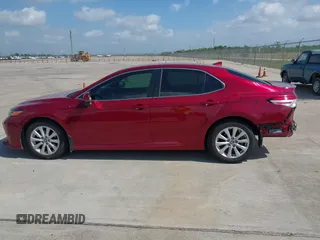 2020 Toyota Camry LE with VIN 4T1L11AK3LU993342, listed as a IAAI auction lot 42033420 with 84,849 mi miles and . Bid and sale history available at DreamBid. Image 14.