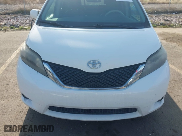 2012 Toyota Sienna SE with VIN 5TDXK3DC1CS221798, listed as a IAAI auction lot 41989210 with 198,962 mi miles. Bid and sale history available at carsss.com. Image 13.