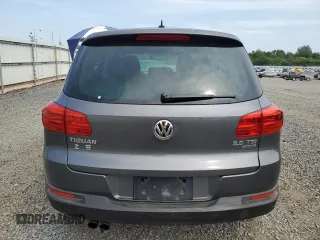 2013 Volkswagen Tiguan S с VIN WVGBV3AX6DW592011, выставлен на аукционе Copart как лот 59802095 с пробегом 112 485 миль миль и Списание • Salvage title. История ставок и продаж доступна на DreamBid. Изображение 6.