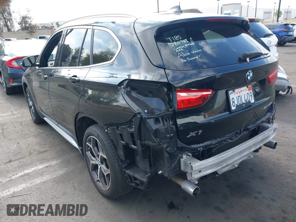 2019 BMW X1 sDrive28i with VIN WBXHU7C59K5L12320, listed as a IAAI auction lot 42116860 with 28,183 mi miles and . Bid and sale history available at DreamBid. Image 3.