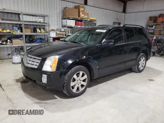 2008 Cadillac SRX RWD z VIN 1GYEE637880104129, wystawiony jako Copart lot #51469055 z przebiegiem 189 095 mil mil oraz Szkoda całkowita • Salvage title. Historia ofert i sprzedaży dostępna na DreamBid. Obrazek 1.