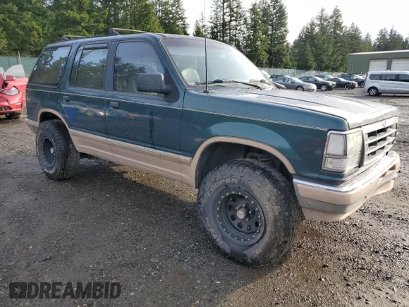 1992 Ford Explorer Eddie Bauer with VIN 1FMDU34X1NUB84827, listed as a Copart auction lot 86973574 with 73,452 mi miles and Salvage title. Bid and sale history available at DreamBid. Image 4.