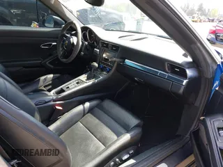 2014 Porsche 911 Carrera z VIN WP0CA2A94ES140857, wystawiony jako IAAI lot #42159010 z przebiegiem 46 230 mil mil oraz . Historia ofert i sprzedaży dostępna na DreamBid. Obrazek 5.