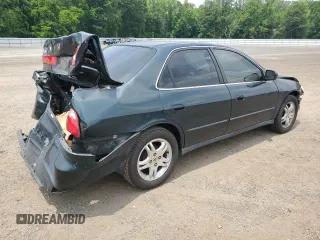 1999 Honda Accord LX with VIN 1HGCG6650XA028790, listed as a Copart auction lot 61014405 with 362,319 mi miles and Salvage title. Bid and sale history available at DreamBid. Image 3.