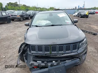 2020 Jeep Compass Trailhawk with VIN 3C4NJDDB3LT200268, listed as a IAAI auction lot 42250192 with 73,804 mi miles and . Bid and sale history available at DreamBid. Image 12.