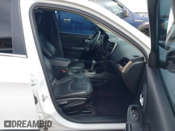 2016 Jeep Cherokee Limited with VIN 1C4PJLDB4GW233315, listed as a IAAI auction lot 41788329 with 116,174 mi miles. Bid and sale history available at carsss.com. Image 5.