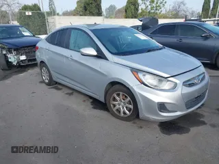 2014 Hyundai Accent GLS with VIN KMHCT4AE6EU586785, listed as a IAAI auction lot 41674060 with 135,355 mi miles. Bid and sale history available at carsss.com. Image 1.