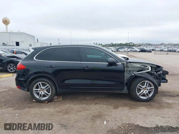 2014 Porsche Cayenne with VIN WP1AA2A21ELA92673, listed as a IAAI auction lot 41597732 with 140,673 mi miles and . Bid and sale history available at DreamBid. Image 14.