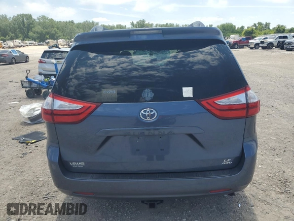 2015 Toyota Sienna LE with VIN 5TDJK3DC4FS107711, listed as a Copart auction lot 57693005 with 141,370 mi miles and Salvage title. Bid and sale history available at DreamBid. Image 6.